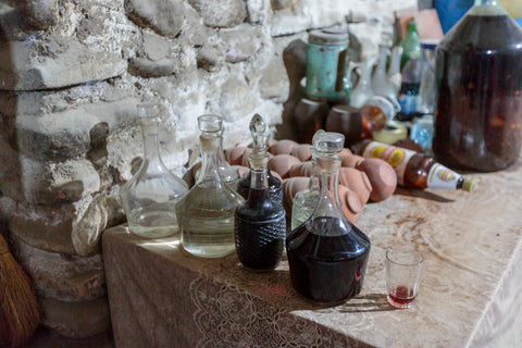 Georgia, Kakheti. Traditionally made wine in glass bottles.